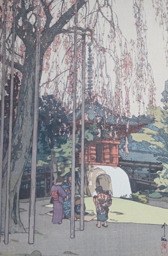 Yoshida Hiroshi (1876-1950), two Japanese woodblock prints, 'The Cherry Tree in Kawagoe, 1935', and 'Kagurazaka Street after a Night Rain, 1929', 37 x 24cm